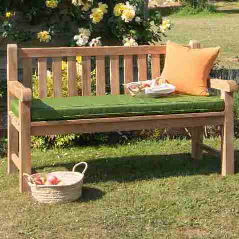  Teakunique's Riverbank Teak Bench with cushions and basket of apples