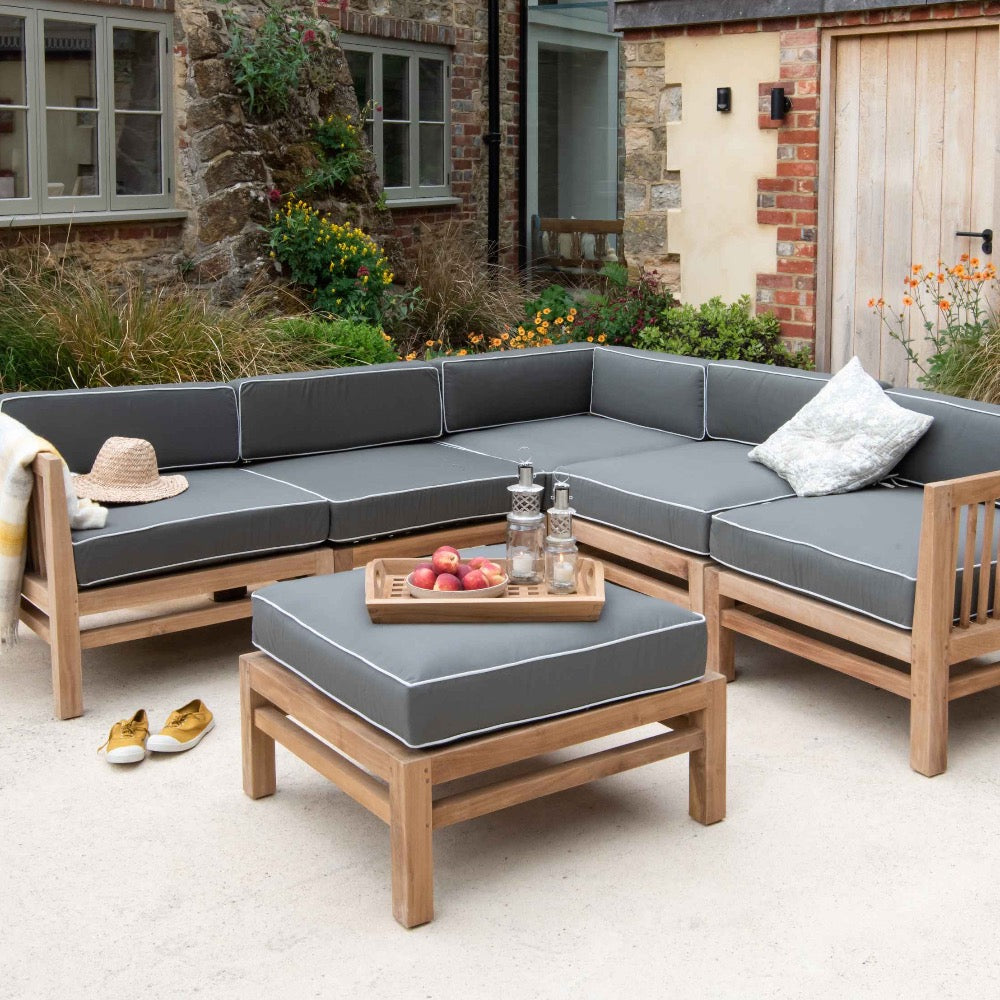 Teak modular outdoor sofa with footrest