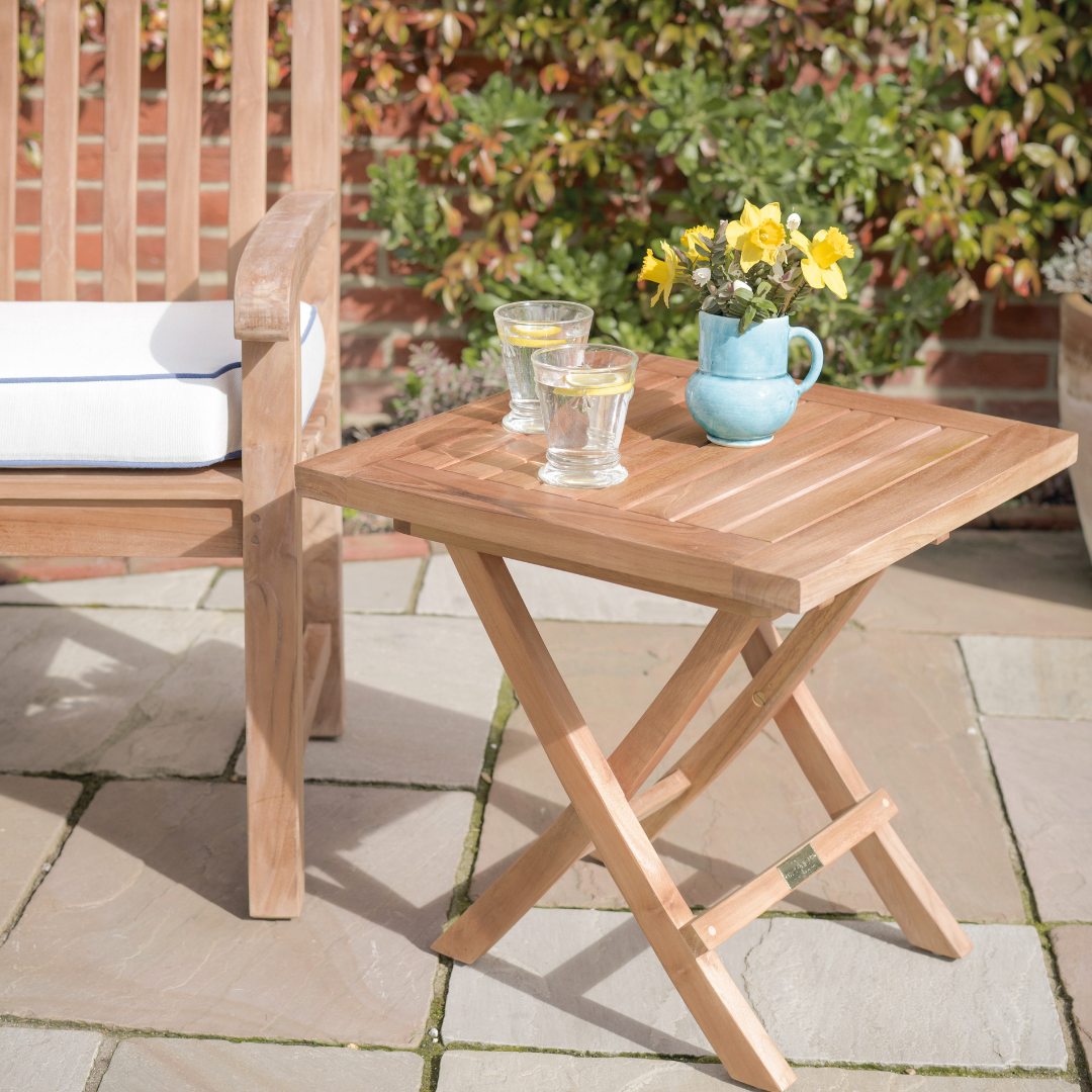 Teak folding coffee table on terrace