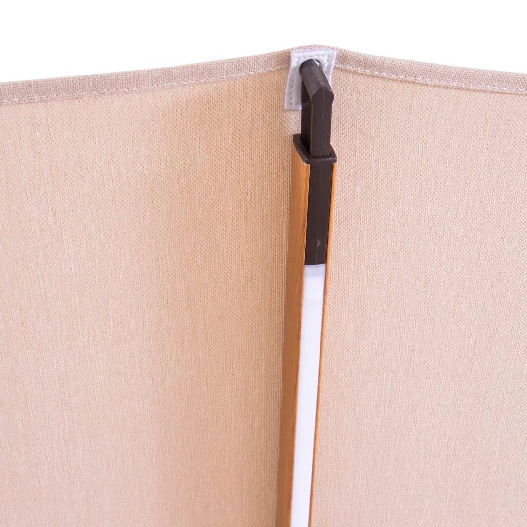 Close up of open beige parasol canopy with metal strut on plain background 