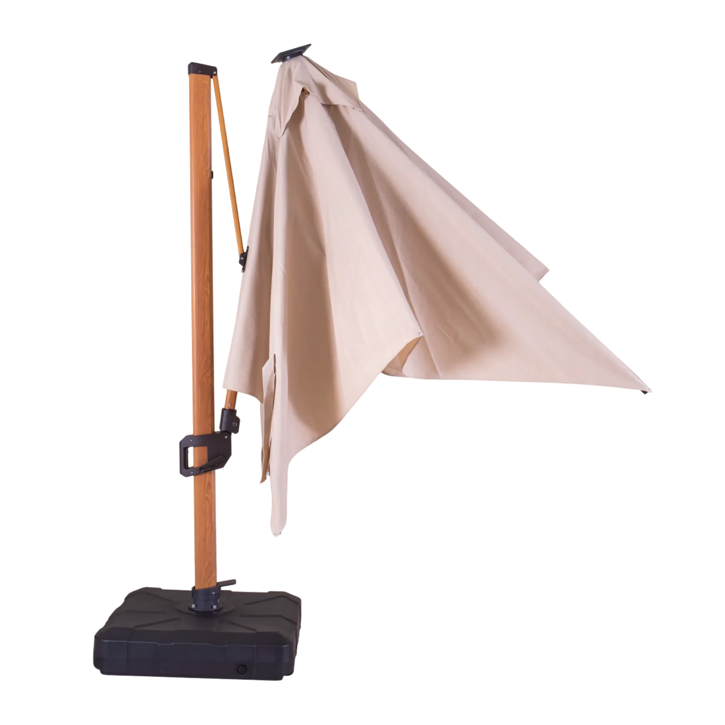 Beige patio umbrella with wooden stand and black base on a white background