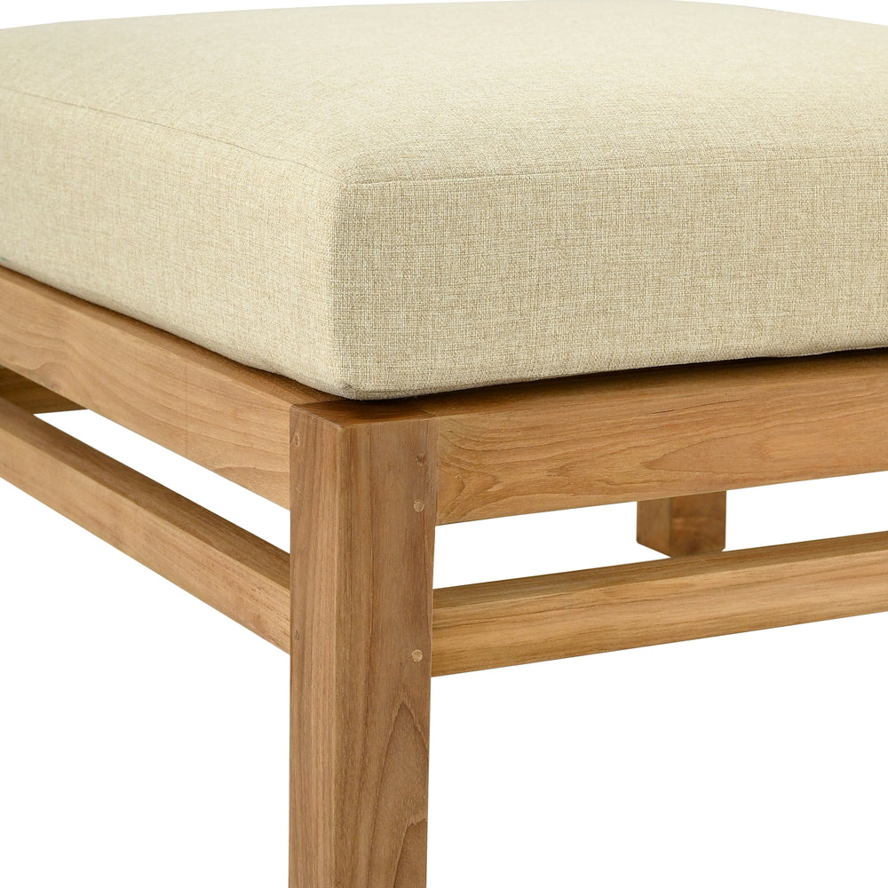 
                  
                    Teak ottoman stool with beige cushioned seat on a white background
                  
                