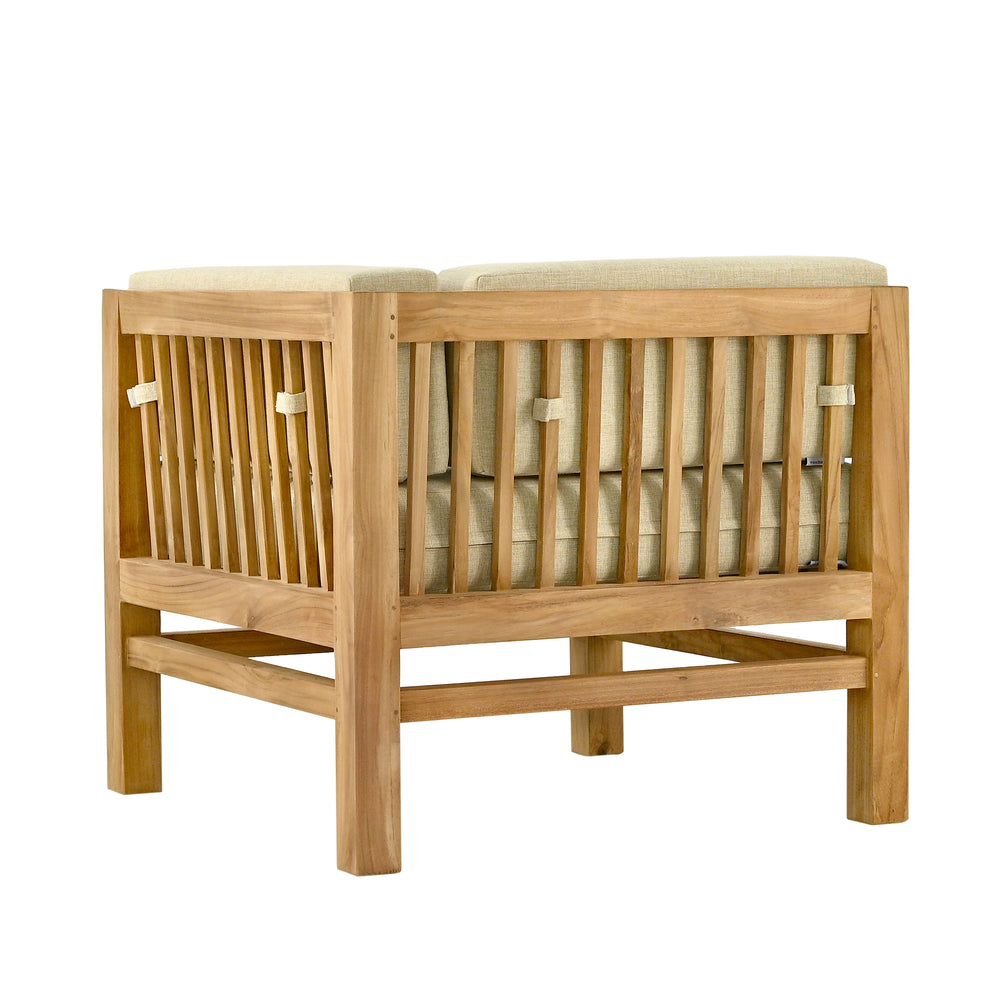 
                  
                    Back of teak outdoor sofa corner unit with  beige cushions visible through slats, on a white background
                  
                