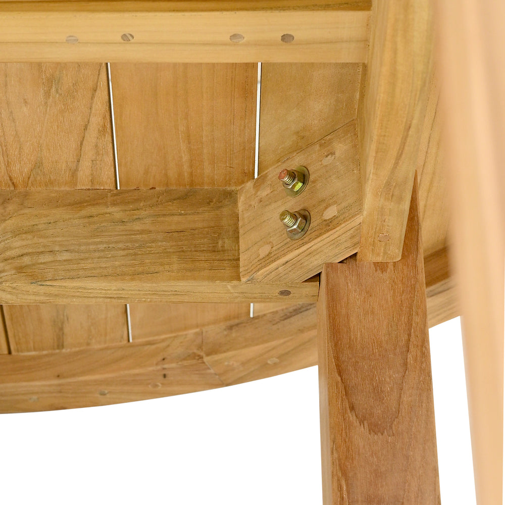 
                  
                    Underside of round teak table. Focus is on the screws that join the table leg and tabletop  
                  
                