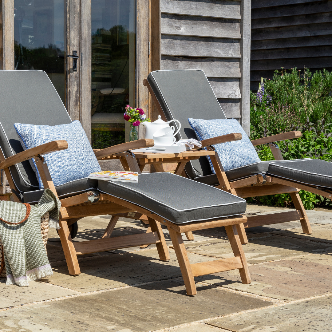  Teakunique's Gili Steamer teak chairs with grey cuchions on terrace