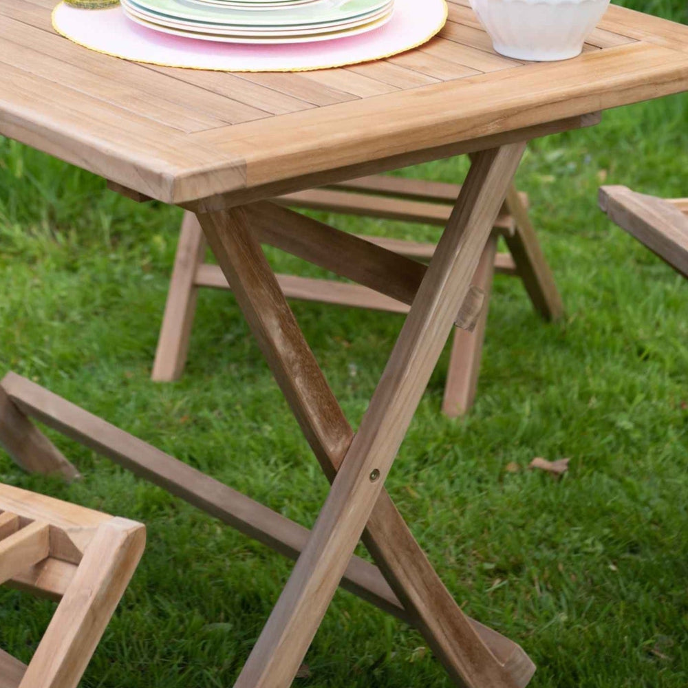 
                  
                    Teak Iris Folding Rectangular Table
                  
                