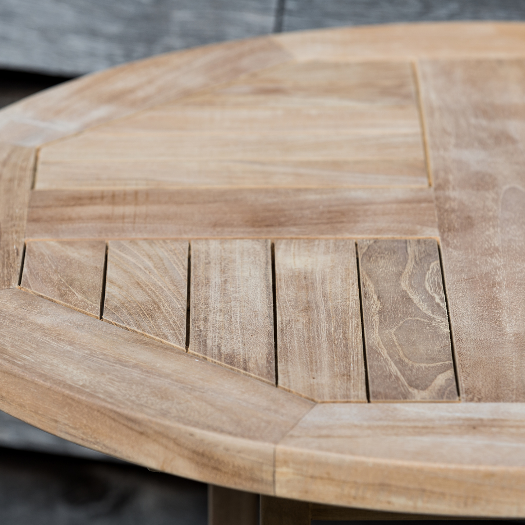 Close up of teak round dining table top 