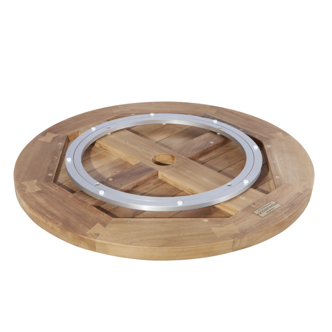 Underside of teak lazy susan turntable with rotating mechanism displayed. 